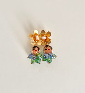 Aretes Estelita azules y verdes transparentes.