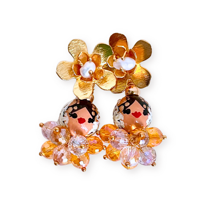 Aretes Estelita naranjas transparentes.