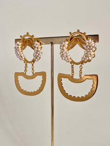 Aretes Heredera empollerada