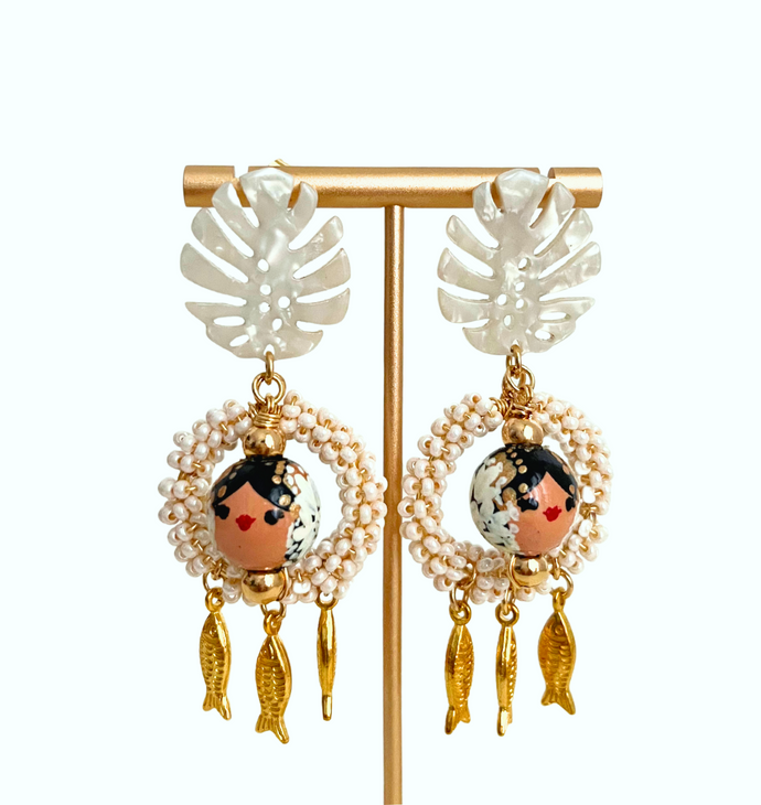 Aretes pollera y peces.