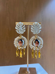 Aretes pollera y peces.