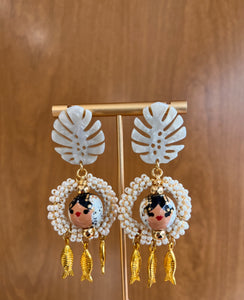 Aretes pollera y peces.