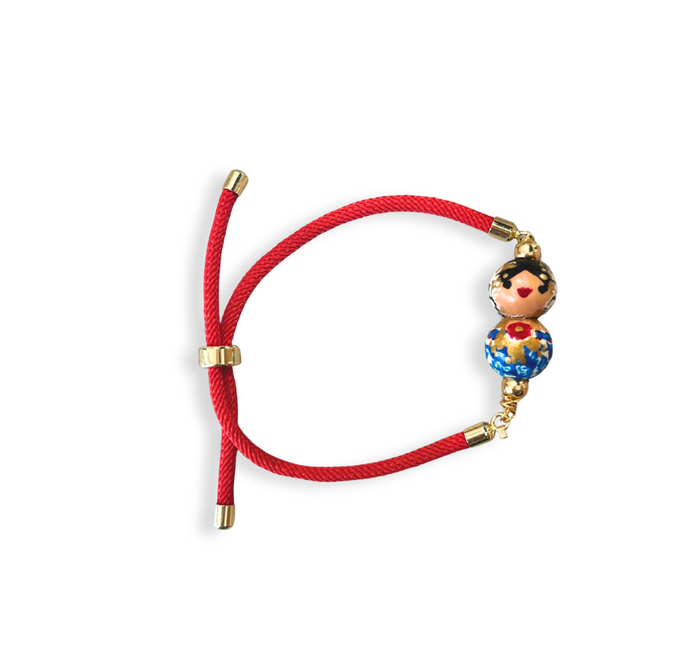Pulsera de cordón rojo empollerada azul