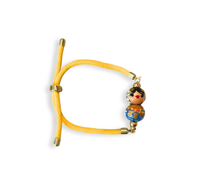 Pulsera de cordón amarillo empollerada azul