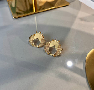 Aretes Donaire.